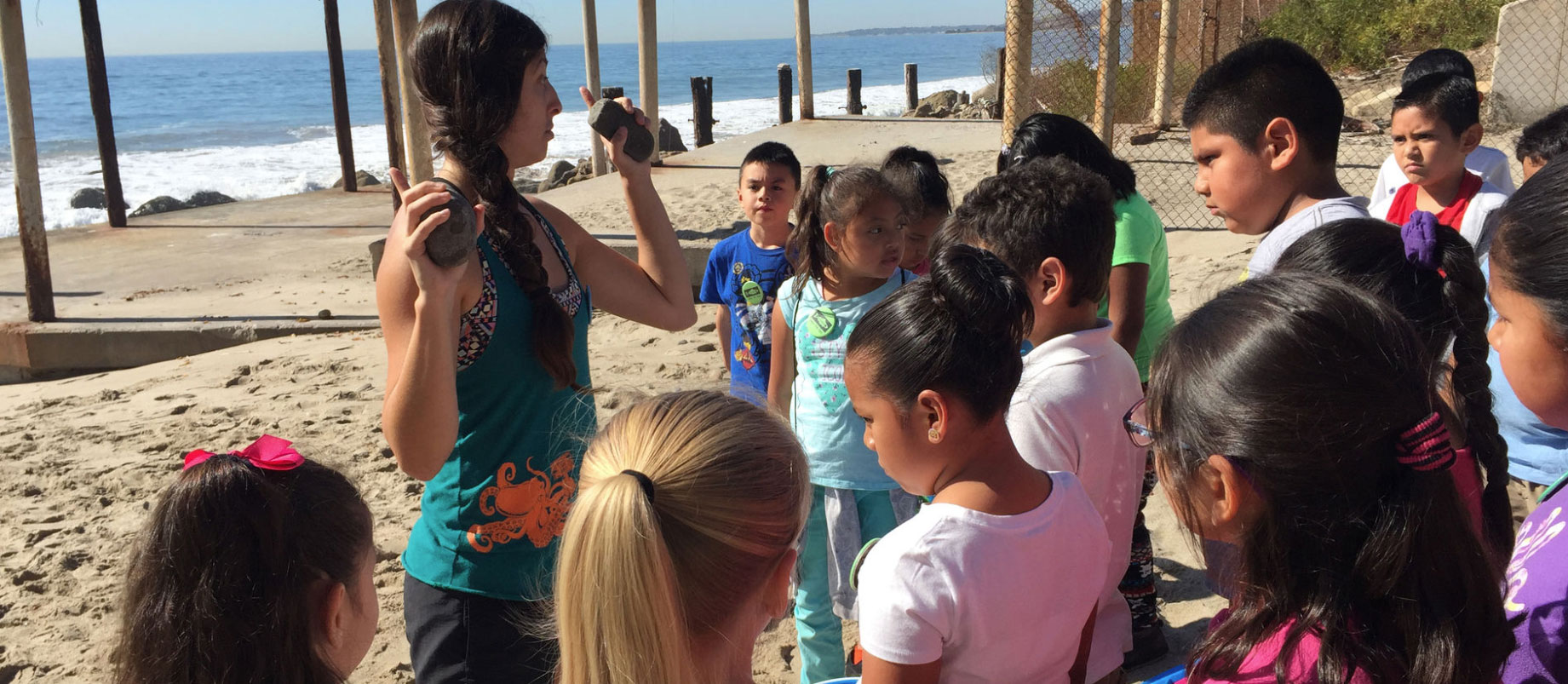 A group of young kids near the beach