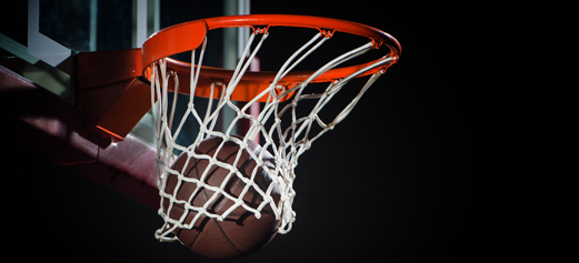 Basketball going through a hoop